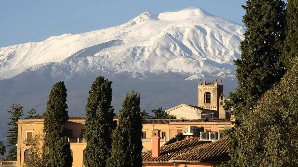 italy, sicily, taormina with mount etna in the background